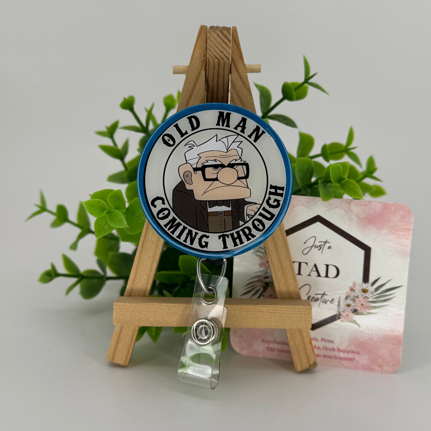 Old Man Coming Through Interchangeable Badge Reel Topper