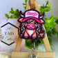 Bougie Highland Cow Interchangeable Badge Topper